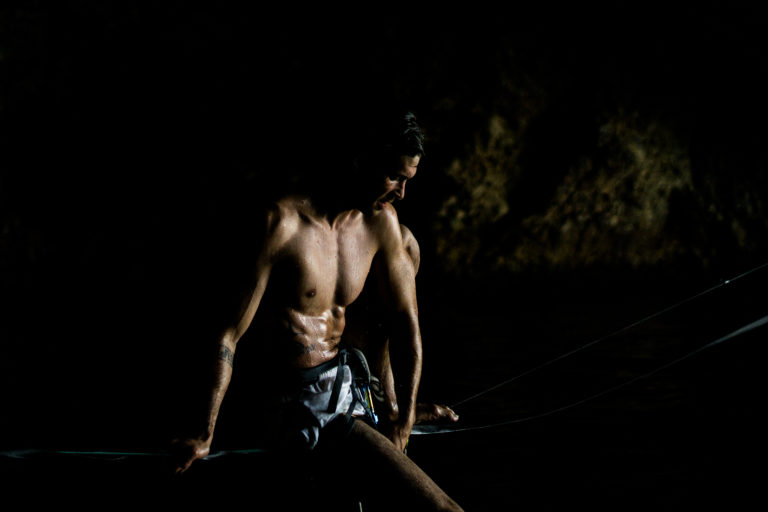 Parkour athlete Christian Harmat on a slackline in a cave in Greece. // Parkour Athlet Christian Harmat auf einer Slackline in einer Höhle in Griechenland